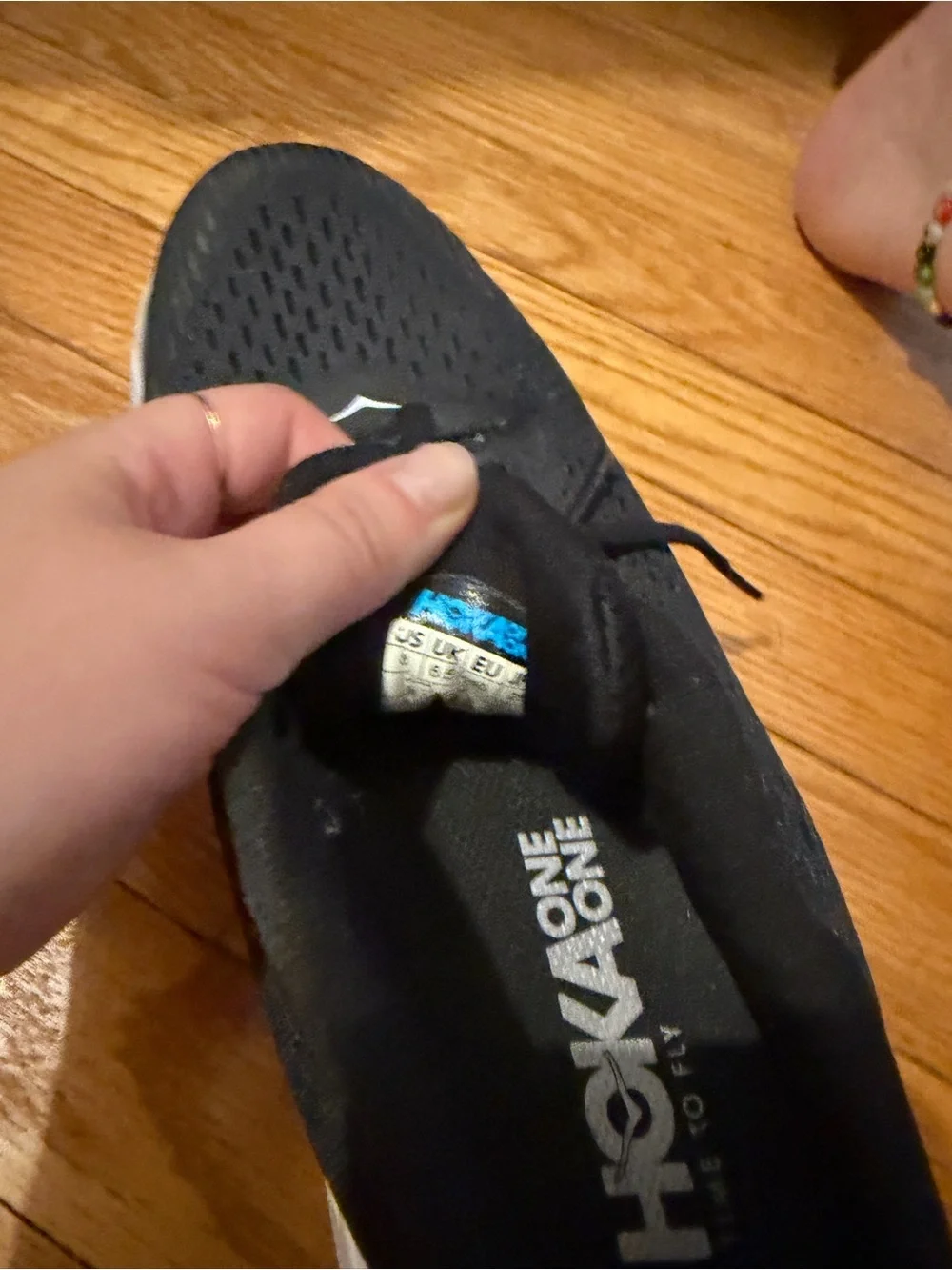 Hoka Black and White Cushioning Running Sneakers